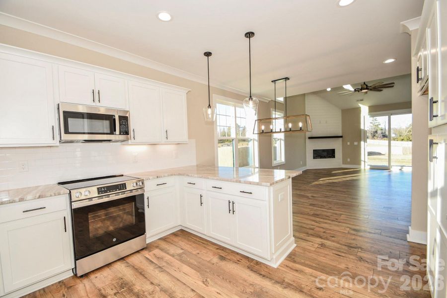 Furnished interior view inside a new home in , Wingate (Image 9).
