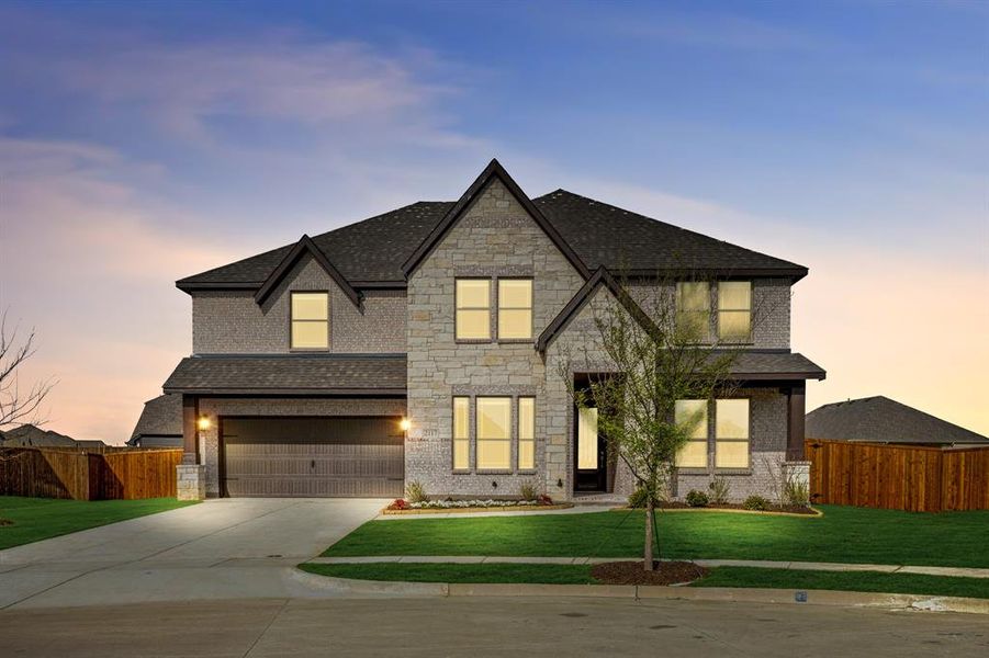 Front exterior of a new home in ArrowBrooke, Aubrey, TX, highlighting curb appeal (Image 1). Front exterior of a new home in ArrowBrooke, Aubrey, TX, highlighting curb appeal (Image 1).
