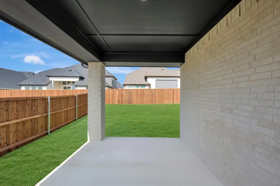 Exterior details and patio area of a home in Sandbrock Ranch, Aubrey (Image 4). Exterior details and patio area of a home in Sandbrock Ranch, Aubrey (Image 4).