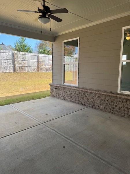 Exterior details and patio area of a home in Cooper's Walk, Loganville (Image 2).