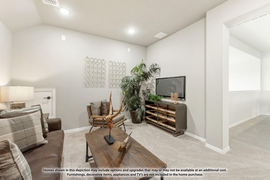 Living room with carpet flooring, leather sofa, wood coffee table, and TV on a metal media console