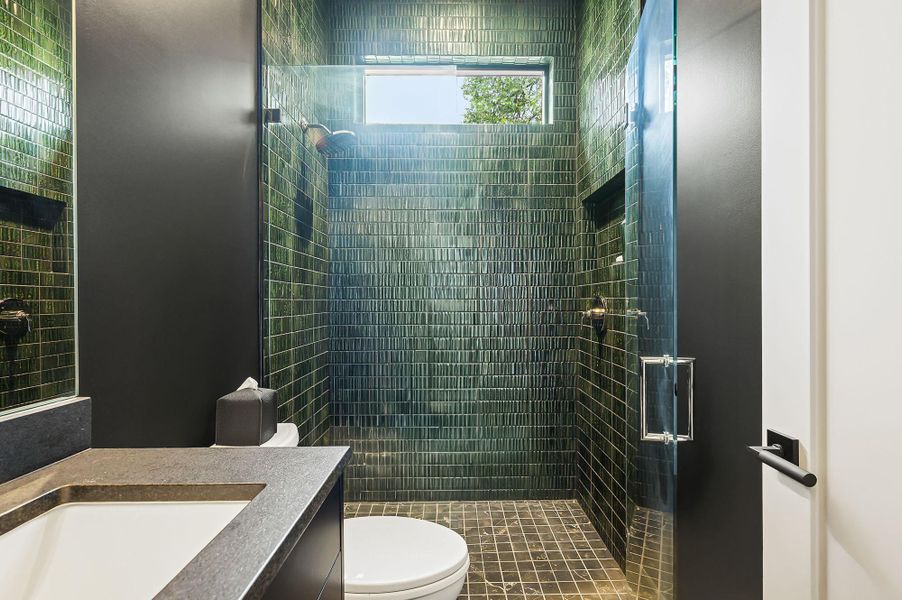 Full bathroom featuring vanity and a stall shower Full bathroom featuring vanity and a stall shower