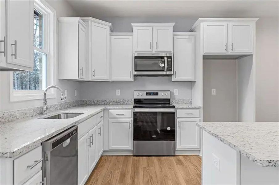 Furnished interior view inside a new home in , Milledgeville (Image 6).