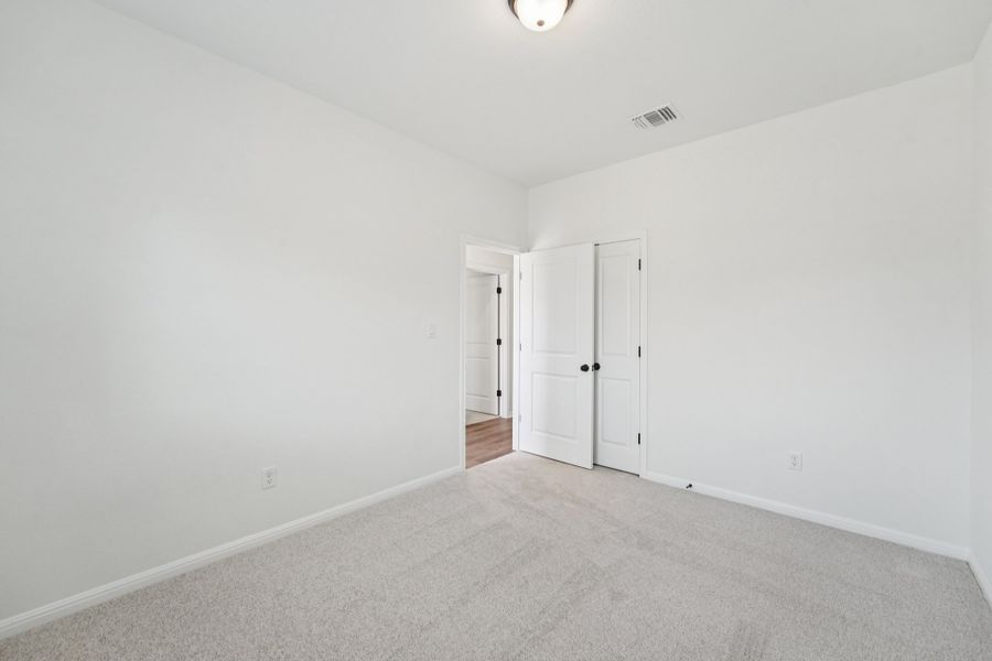 Spacious, unfurnished interior of a new home in Crosswinds, Kyle (Image 28).