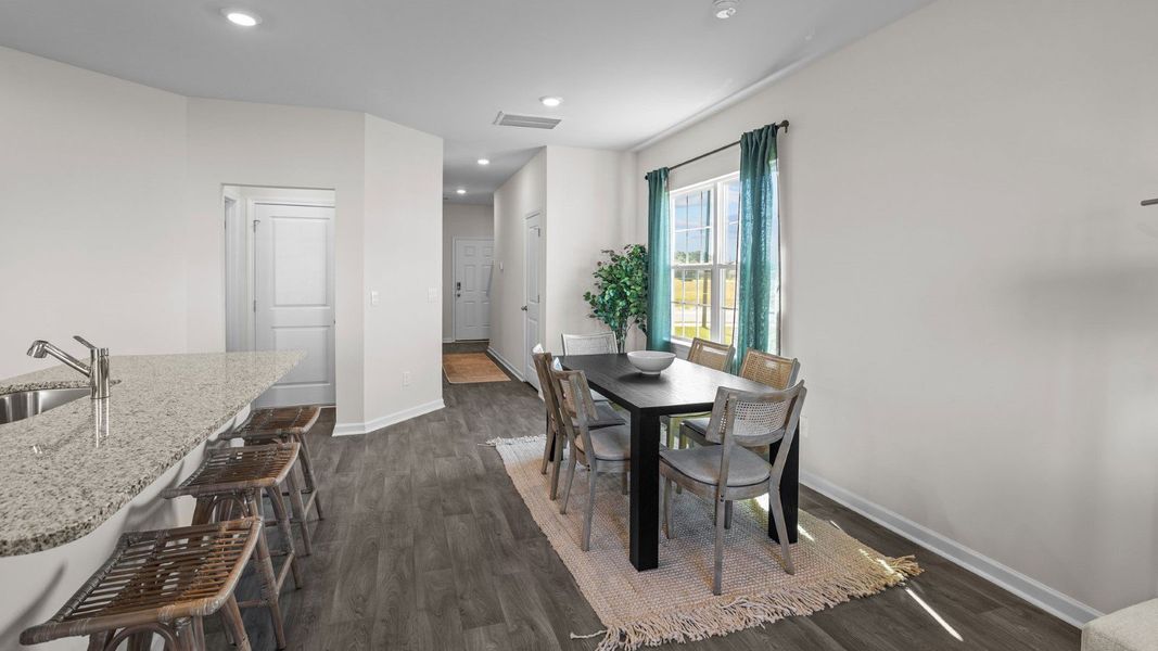 Furnished interior view inside a new home in The Townes at Ridgewood Farms, Winterville (Image 8). Furnished interior view inside a new home in The Townes at Ridgewood Farms, Winterville (Image 8).