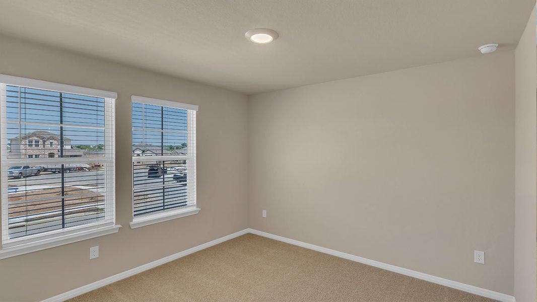 Representative unfurnished interior of a home built from the The Quincy by D.R. Horton in Monarch Ranch, Manor (Image 12).