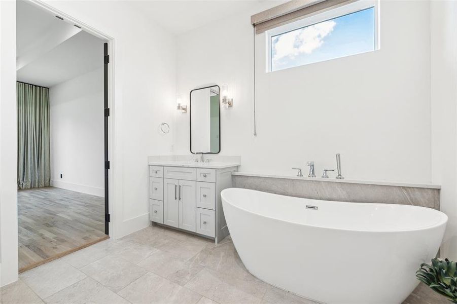 Bathroom with vanity and tile patterned floors