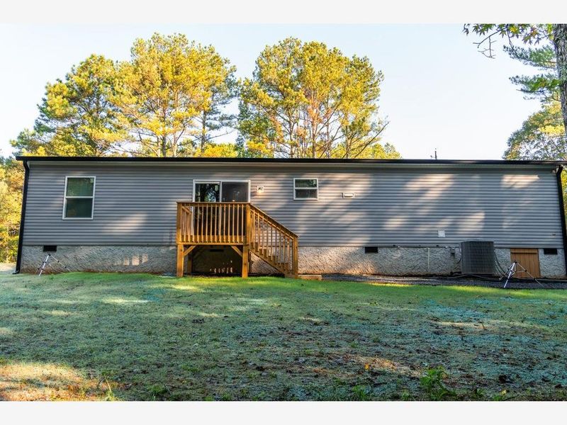 Exterior details and patio area of a home in , Taylorsville (Image 18).