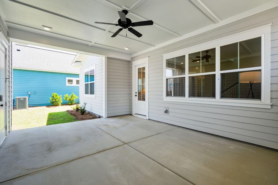 Exterior details and patio area of a home in The Domus Collection at Midtown Nexton, Summerville (Image 23).