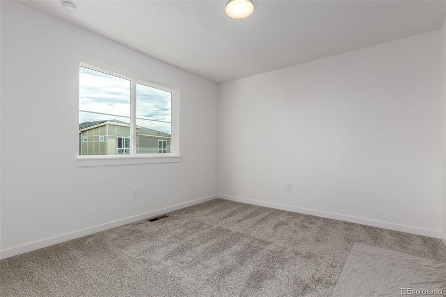 Spacious, unfurnished interior of a new home in The Commons at Victory Ridge, Colorado Springs (Image 20).
