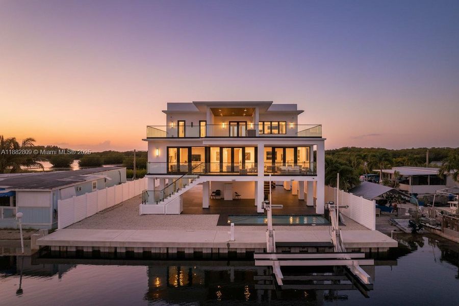 Front exterior of a new home in , Key Largo, FL, highlighting curb appeal (Image 26).