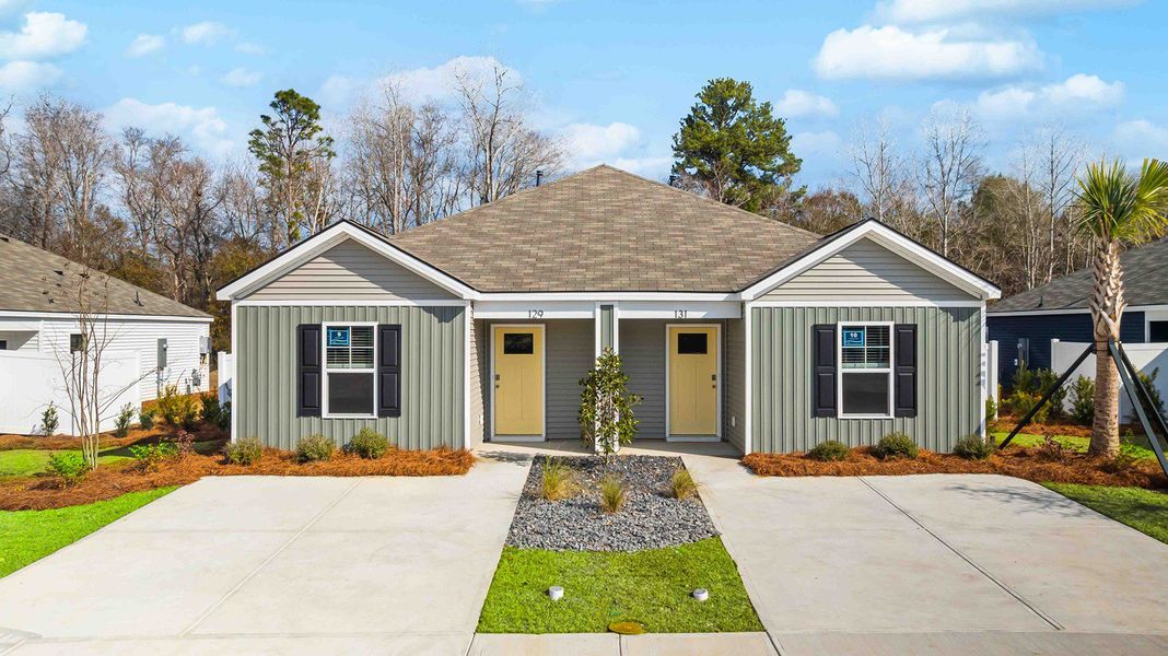 Front exterior of a new home in The Timbers, Harleyville, SC, highlighting curb appeal (Image 1). Front exterior of a new home in The Timbers, Harleyville, SC, highlighting curb appeal (Image 1).