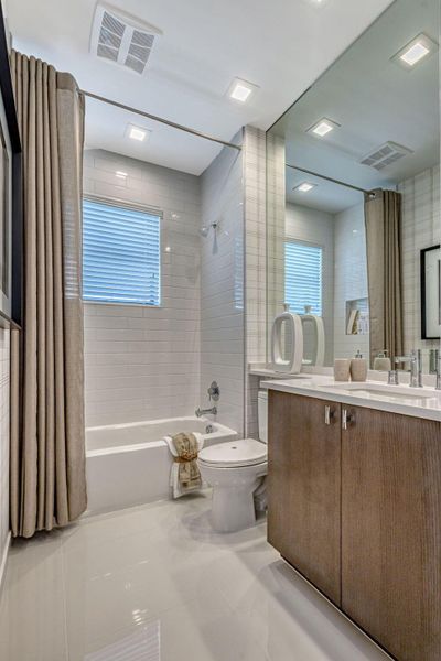 Furnished interior view inside a new home in Apex at Avenir, Palm Beach Gardens (Image 69).