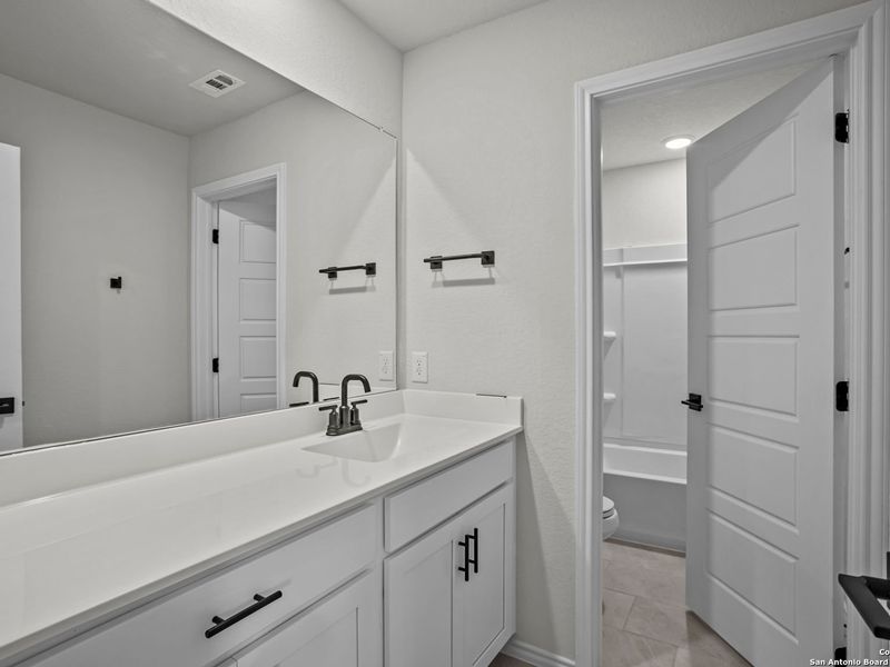 Furnished interior view inside a new home in Horizon Pointe, San Antonio (Image 14). Furnished interior view inside a new home in Horizon Pointe, San Antonio (Image 14).