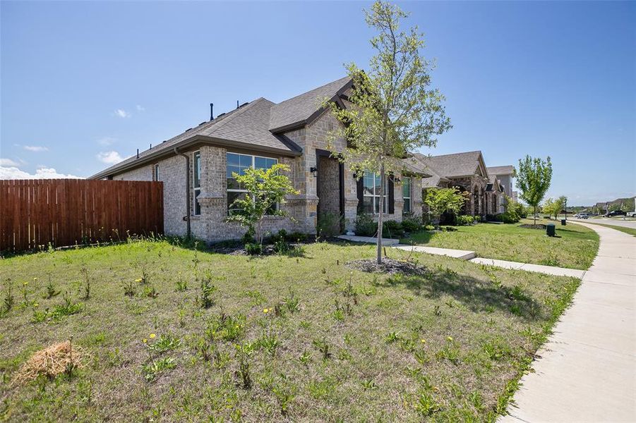 Front exterior of a new home in , Crandall, TX, highlighting curb appeal (Image 20).