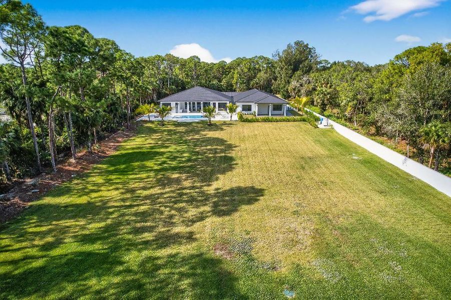 Exterior details and patio area of a home in , Jupiter (Image 18).