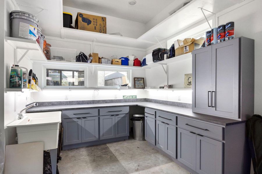 Work station in 3 car garage. Behind the pool bathroom.