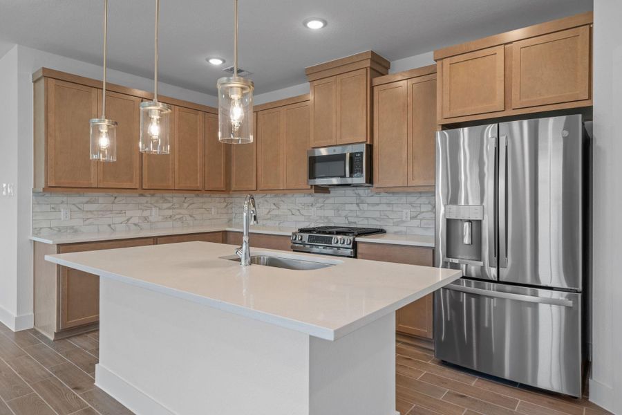 Furnished interior view inside a new home in Meridiana, Iowa Colony (Image 6).