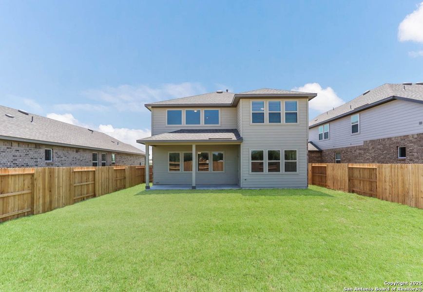 Front exterior of a new home in Buffalo Crossing – New Phase Now Preselling, Cibolo, TX, highlighting curb appeal (Image 1).