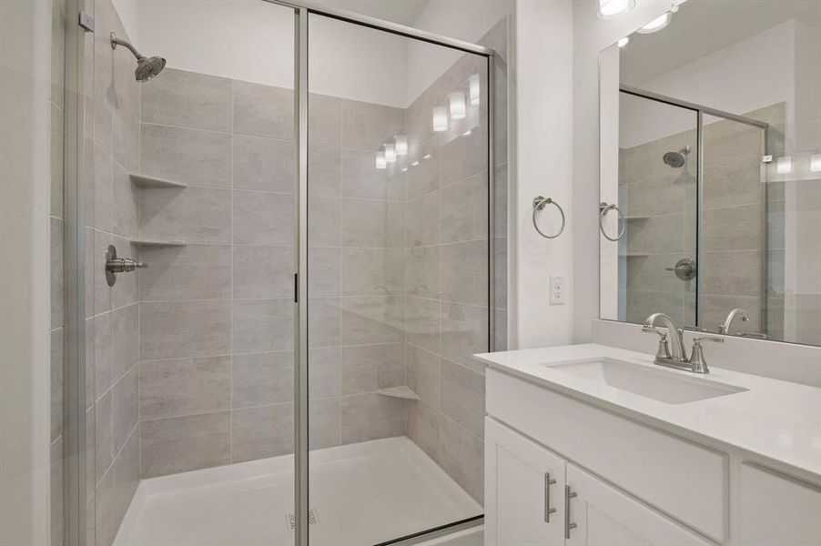 You will never want to leave this spacious walk in owner's shower!