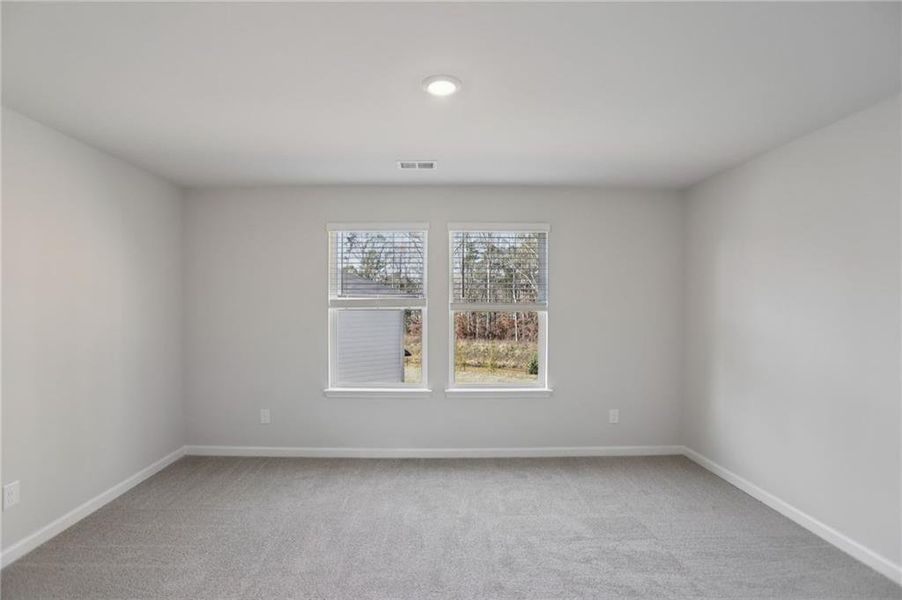 Spacious, unfurnished interior of a new home in Westmont Preserve, Powder Springs (Image 26).