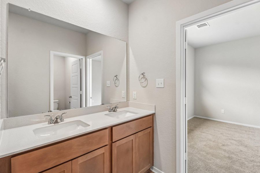 Furnished interior view inside a new home in Hunters Ranch, San Antonio (Image 9).