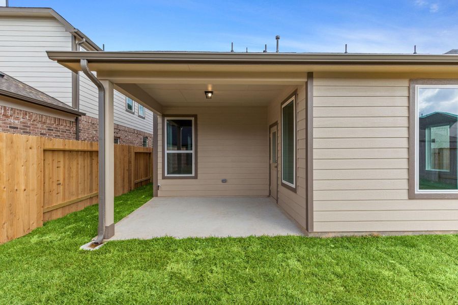 Exterior details and patio area of a home in Barton Creek Ranch, Conroe (Image 4). Exterior details and patio area of a home in Barton Creek Ranch, Conroe (Image 4).