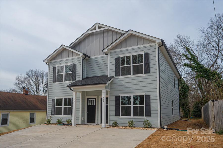Front exterior of a new home in , Hickory, NC, highlighting curb appeal (Image 15).