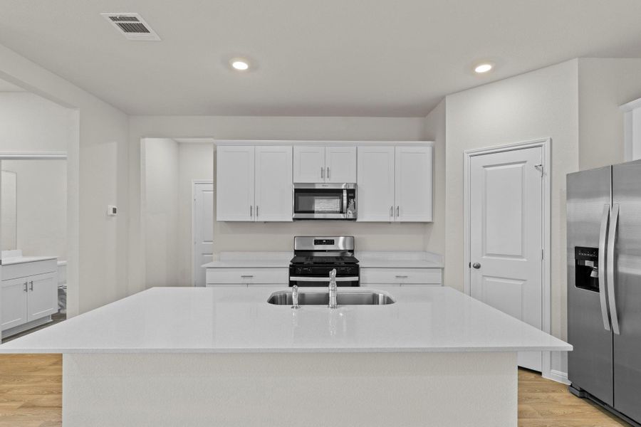 Furnished interior view inside a new home in Whisper South, San Marcos (Image 6).