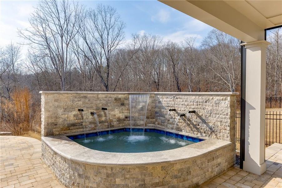 Exterior details and patio area of a home in The Retreat at Sterling on the Lake 48', Flowery Branch (Image 3).