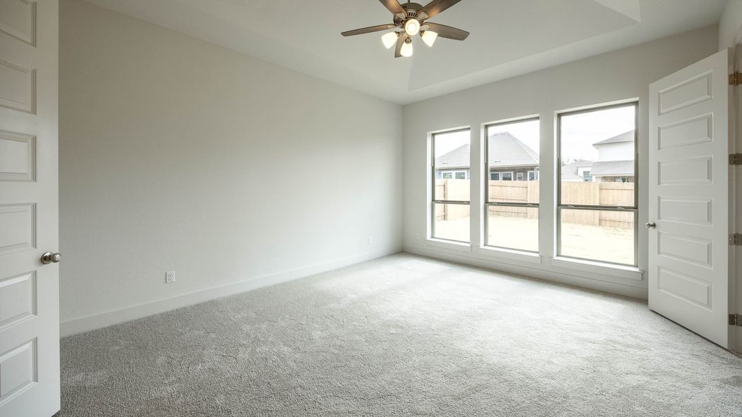 Spacious, unfurnished interior of a new home in The Colony, Bastrop (Image 12).