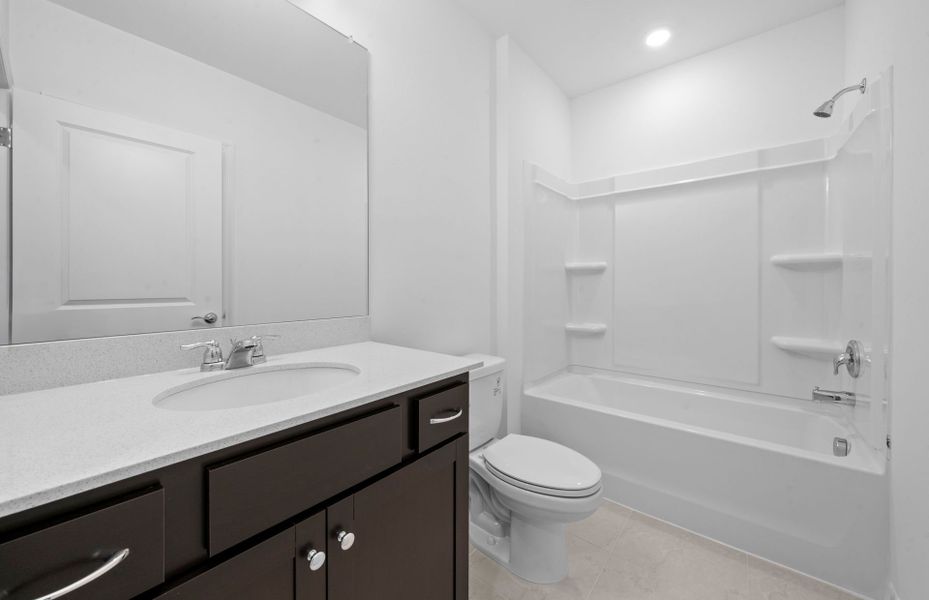 Furnished interior view inside a new home in Whispering Lakes, Lehigh Acres (Image 17).