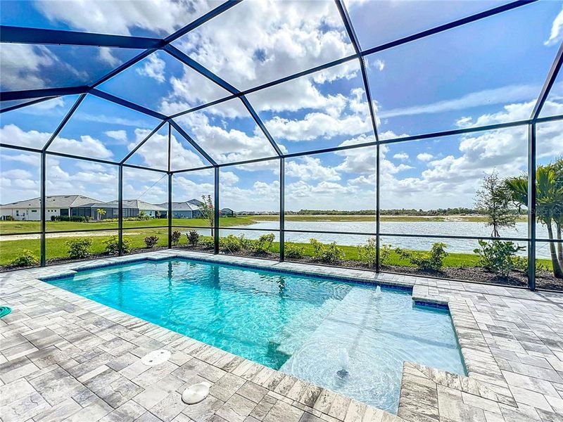 Exterior details and patio area of a home in Watercolor Place, Bradenton (Image 33).