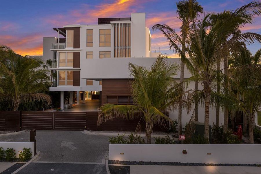 Front exterior of a new home in , Sarasota, FL, highlighting curb appeal (Image 12).