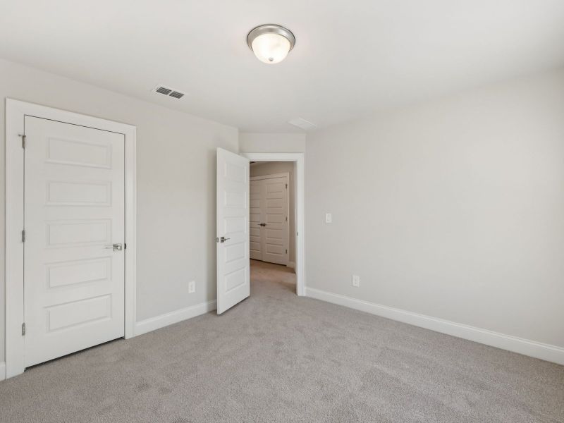 Spacious, unfurnished interior of a new home in Hemingway - Highland Series, Cumming (Image 18). Spacious, unfurnished interior of a new home in Hemingway - Highland Series, Cumming (Image 18).