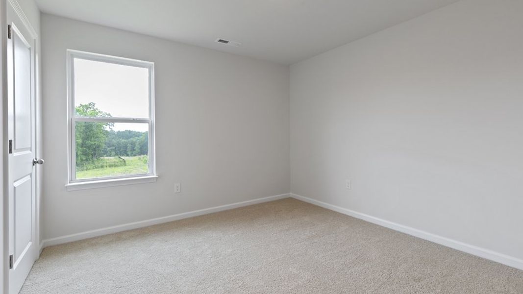 Spacious, unfurnished interior of a new home in Villa Grande, Winterville (Image 32).