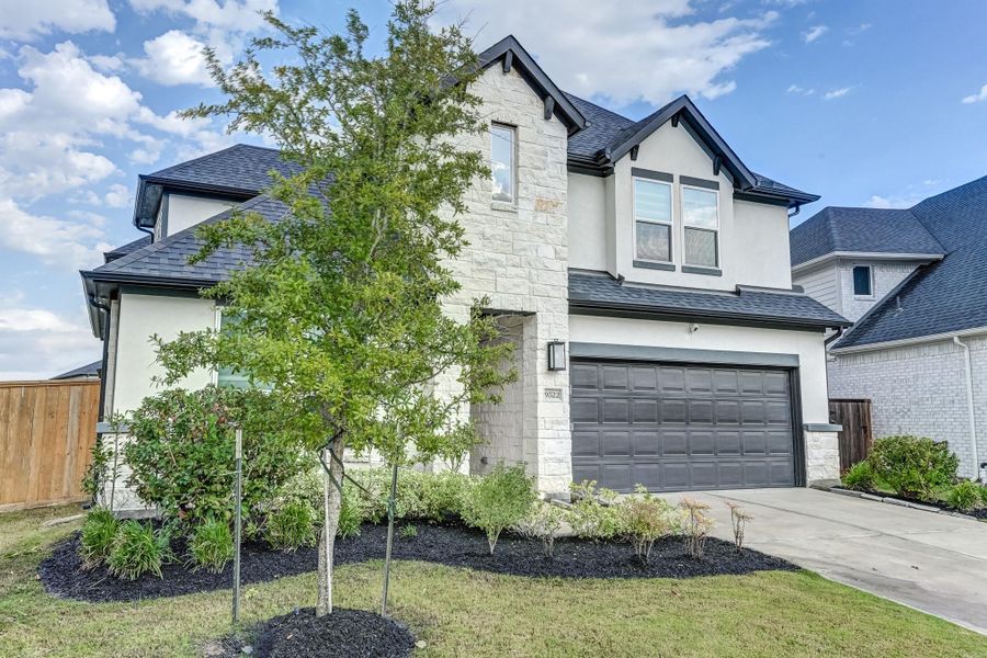 Front exterior of a new home in , Cypress, TX, highlighting curb appeal (Image 26).