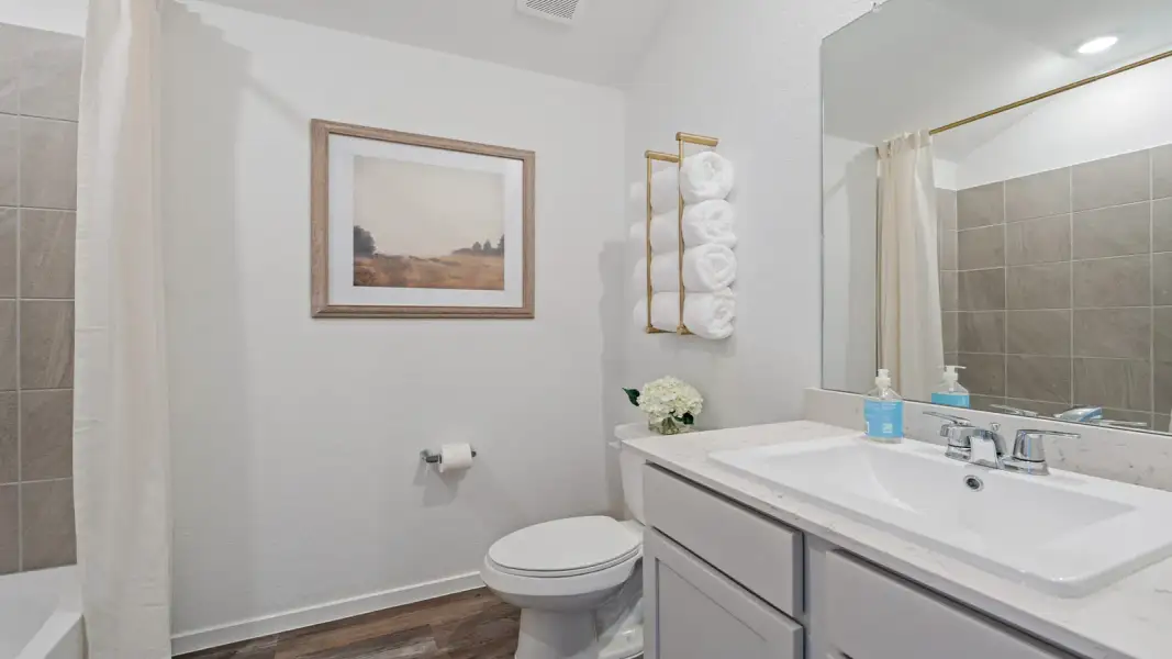 Furnished interior view inside a new home in Sunterra Lakes, Brookshire (Image 7).