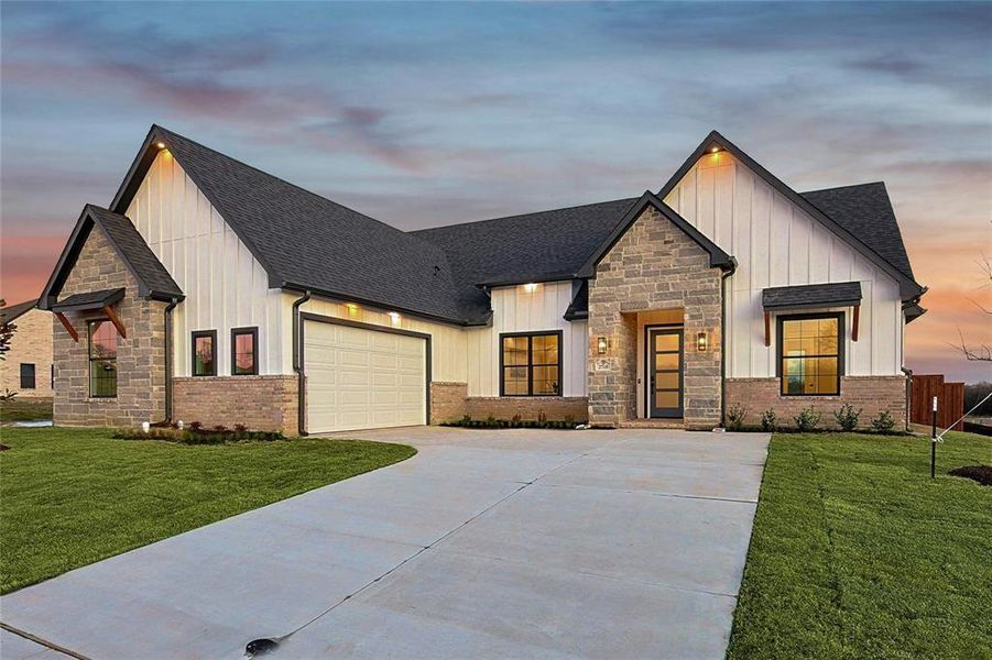 Side facing 2 car garage, doublewide driveway