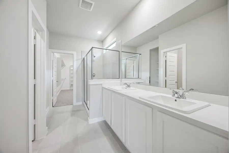 Primary Bathroom in the Willow home plan by Trophy Signature Homes – REPRESENTATIVE PHOTO Primary Bathroom in the Willow home plan by Trophy Signature Homes – REPRESENTATIVE PHOTO