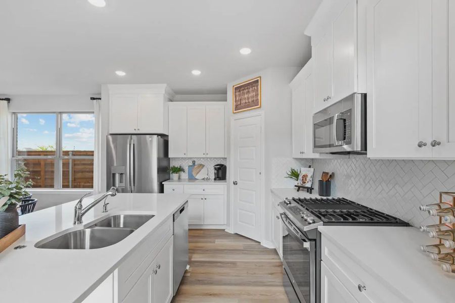 Representative furnished interior of a home built from the San Francisco by Chesmar Homes in Avondale, Fate (Image 5).