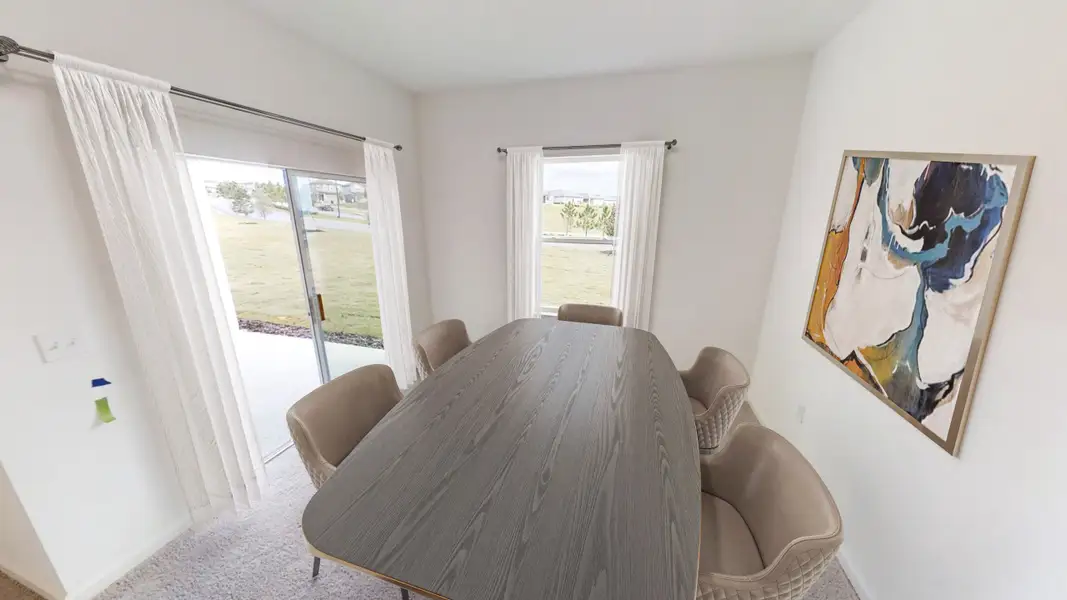 Representative furnished interior of a home built from the Hawking by Starlight Homes in Hawks Run, Kissimmee (Image 8).