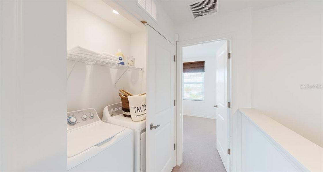 Furnished interior view inside a new home in The Townhomes at Westview, Kissimmee (Image 14).