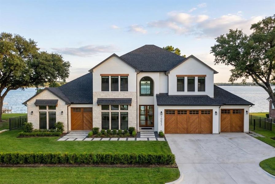 Front exterior of a new home in , Frisco, TX, highlighting curb appeal (Image 2). Front exterior of a new home in , Frisco, TX, highlighting curb appeal (Image 2).