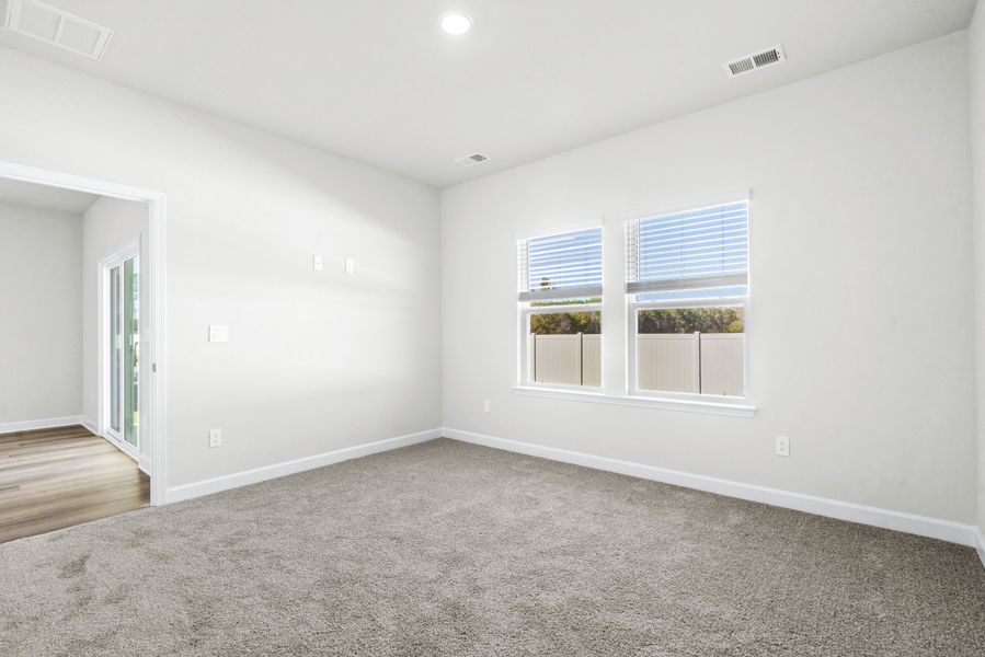 Spacious, unfurnished interior of a new home in Cypress Ridge - The Boardwalk Series, Longs (Image 17).