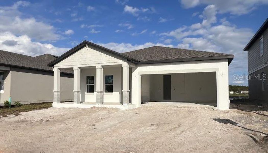 Exterior details and patio area of a home in Hawks Run, Kissimmee (Image 2). Exterior details and patio area of a home in Hawks Run, Kissimmee (Image 2).