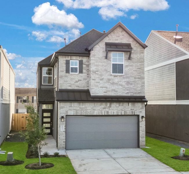 Front exterior of a new home in Meridiana, Manvel, TX, highlighting curb appeal (Image 26).