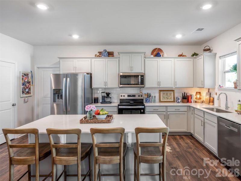 Kitchen with spacious island and upgraded countertops! Kitchen with spacious island and upgraded countertops!