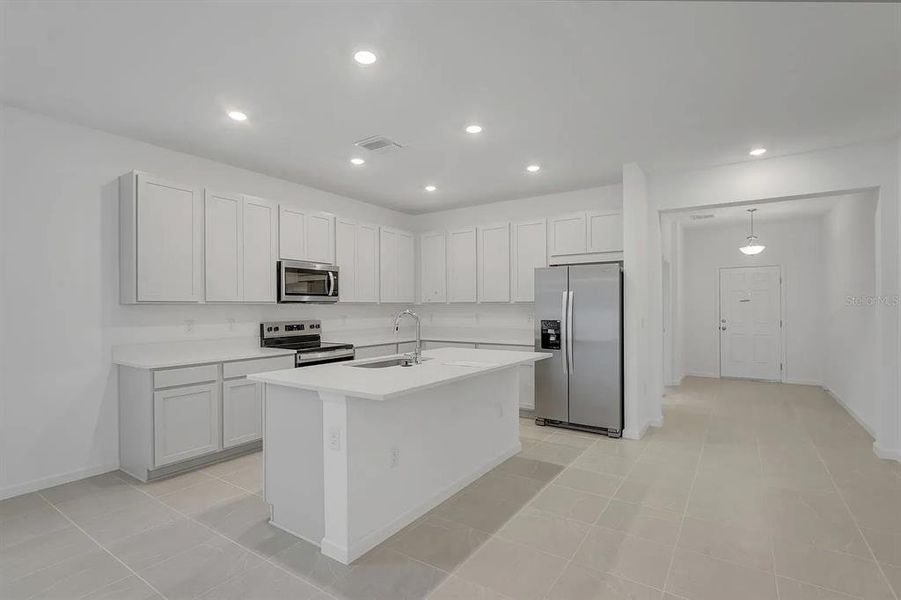 Furnished interior view inside a new home in Cypress Park Estates, Haines City (Image 12).
