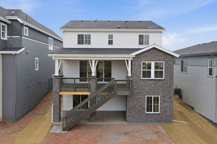 Exterior details and patio area of a home in Sterling Ranch Ascent Village, Littleton (Image 3).